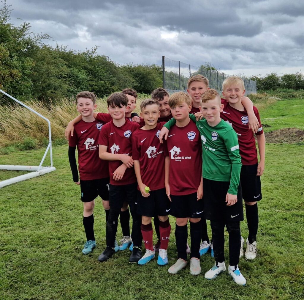 Boys football team lining up