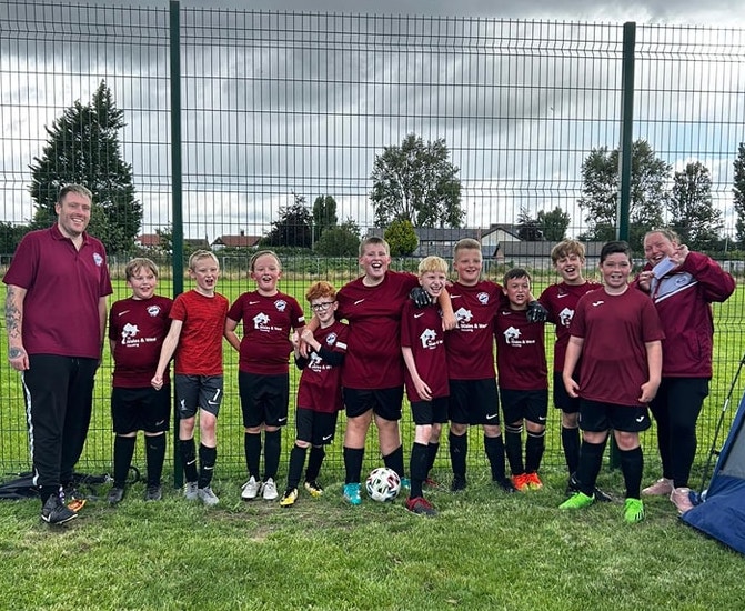 Boys football team lining up