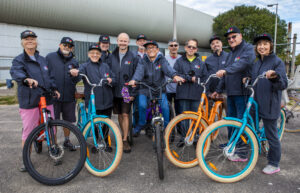 Group shot of cyclists with bikes