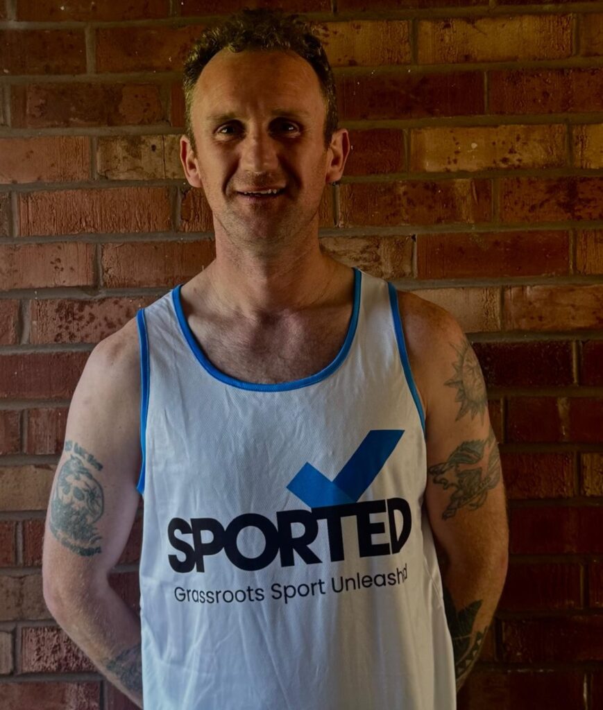 Mark in running vest