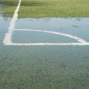 close up of a flooded sports pitch