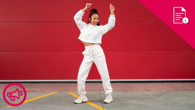 woman dancing outside a red garage door with red marketing graphic and red information graphic