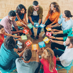 circle of people with superimposed social media logos